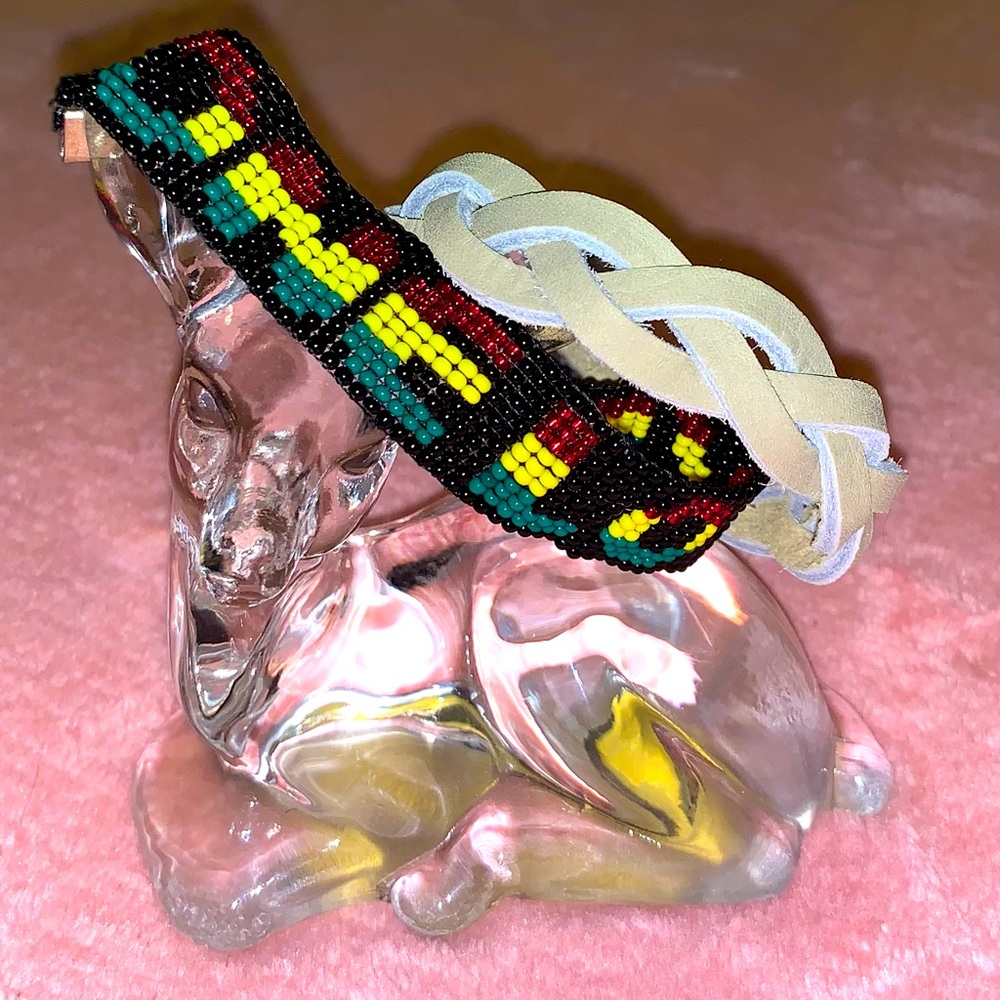 One Love glass bead woven bracelet , with a leather mystery braid bracelet